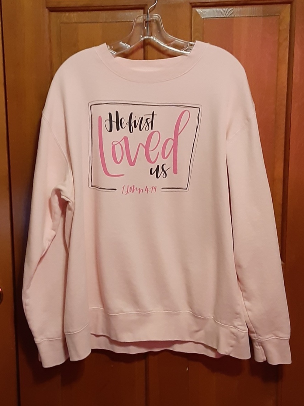 He First Loved Us Pink Sweatshirt
